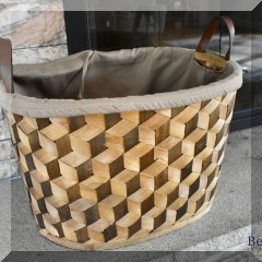 D46. Woven basket with cube design, fabric liner, and leather handles. - $